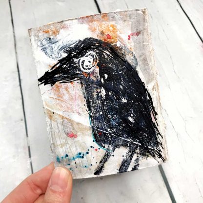 Journal with grungy crow