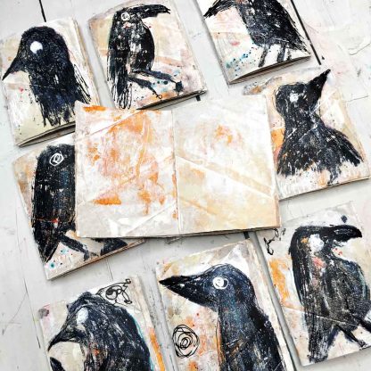 Journals with grungy crows one journal is open